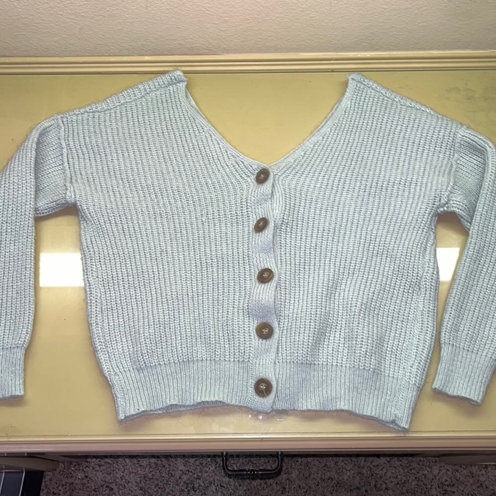 blue button up sweater